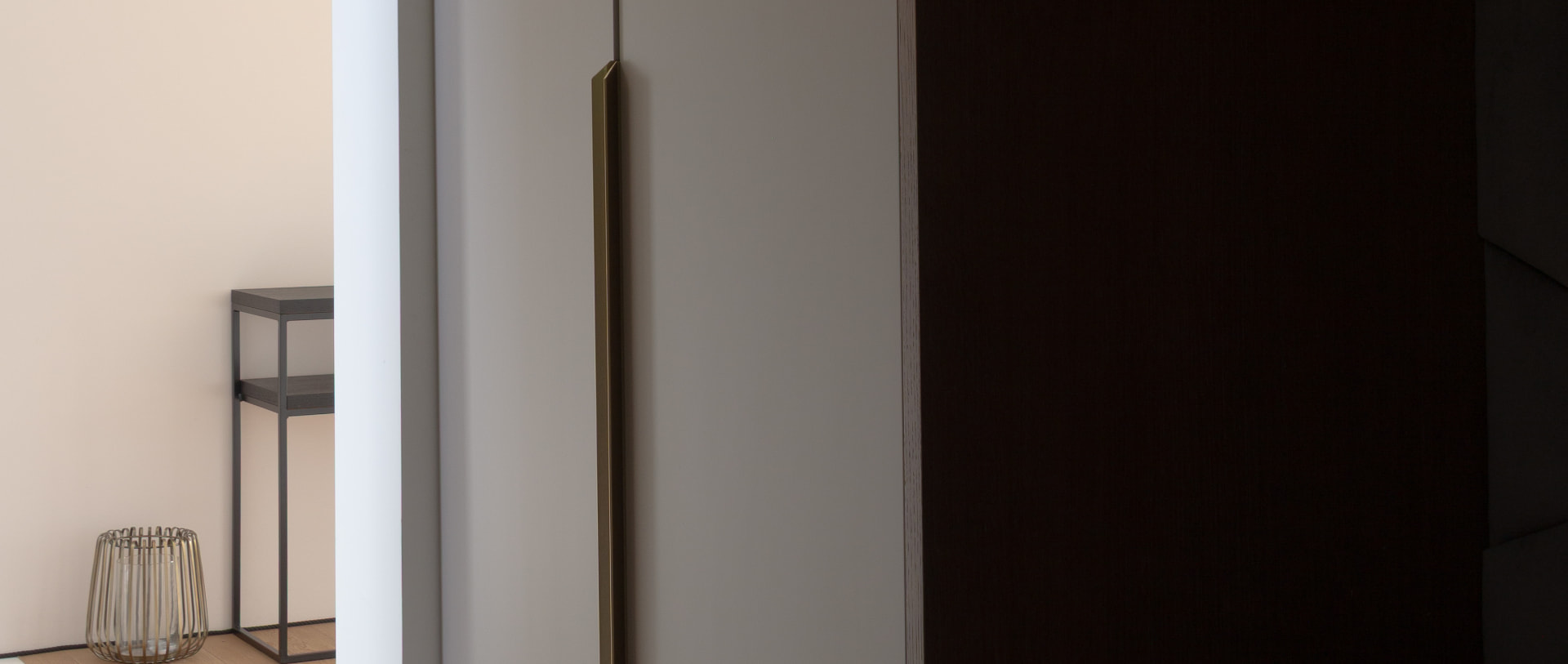 Custom cabinetry and brass handle detail